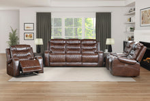 Brown sofa set in a living room with wooden floor and large windows.