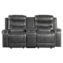 Gray recliner with quilted design on a white background