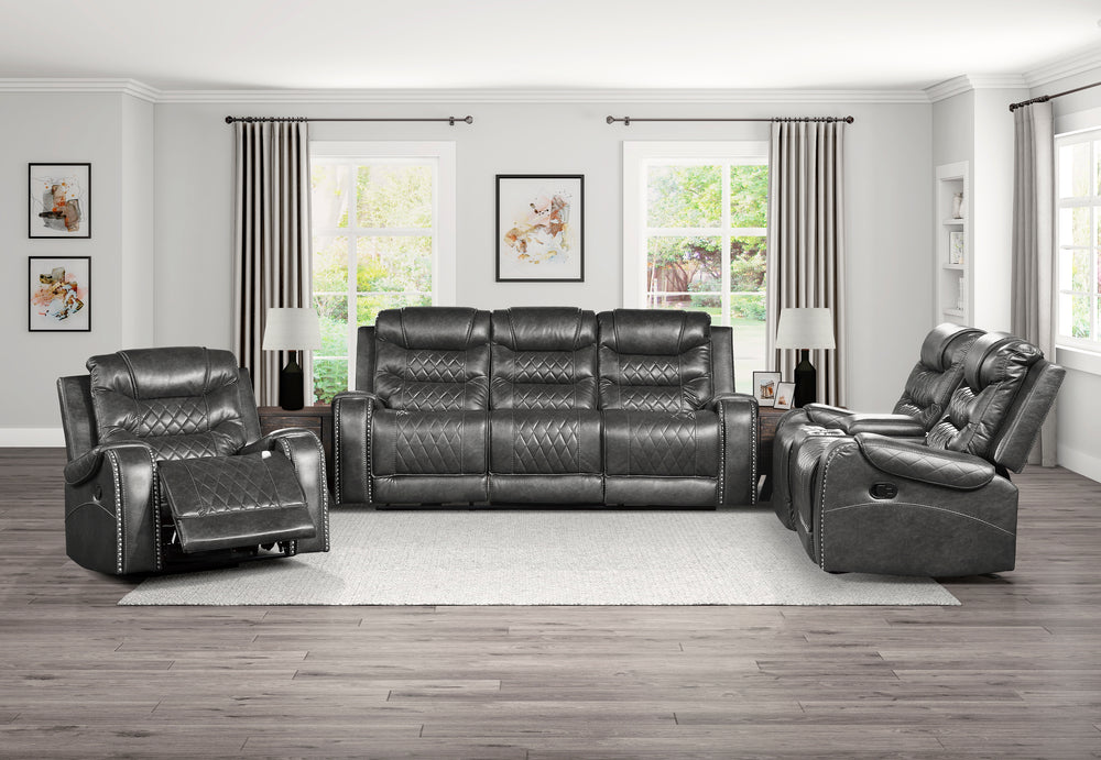 Gray reclining sofa set in a living room with large windows.