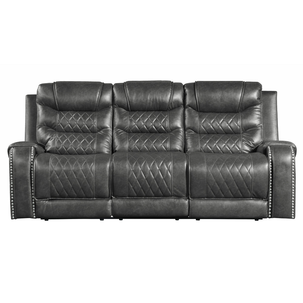 Gray reclining sofa with quilted pattern on a white background