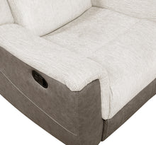 Close-up of a beige recliner sofa with a visible power button.