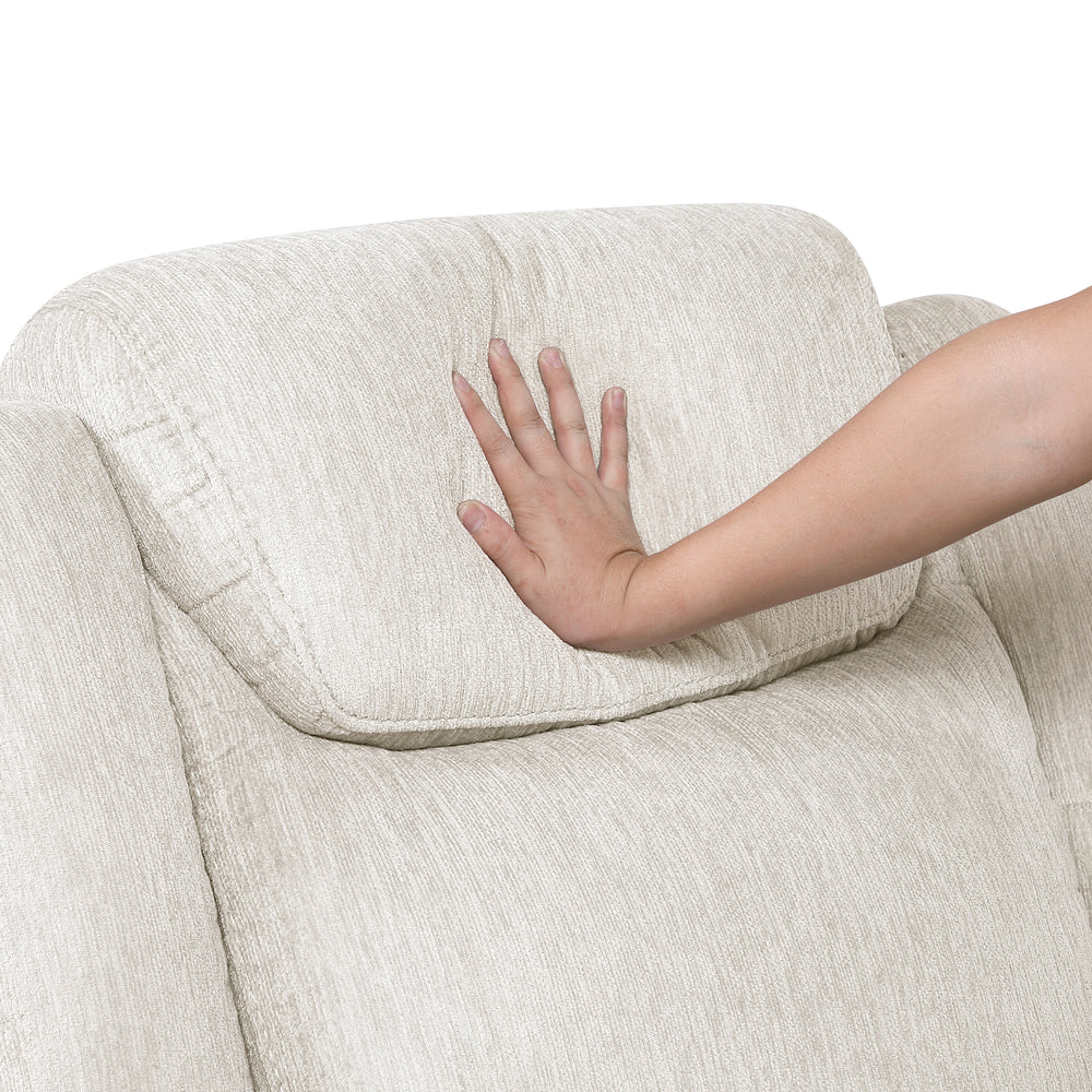 Hand touching a textured armrest of a beige -colored loveseat