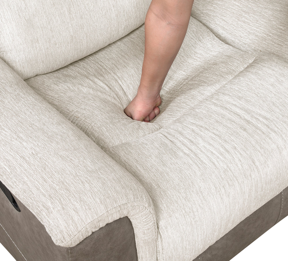 Close-up of a beige fabric sofa with a person's foot on it
