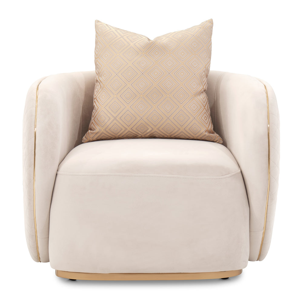 Beige armchair with a patterned pillow on a white background