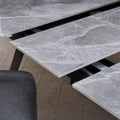 Larchmont Extendable Stone Top Metal Leg Dining Table in Piedra and Black