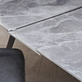 Larchmont Extendable Stone Top Metal Leg Dining Table in Piedra and Black