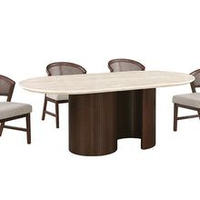 Sorrento oval travertine dining table with rattan back chairs lifestyle